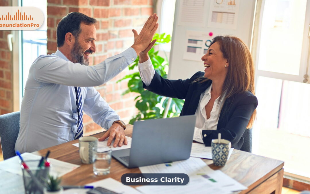 Business professionals celebrating clear communication in a bright office meeting
