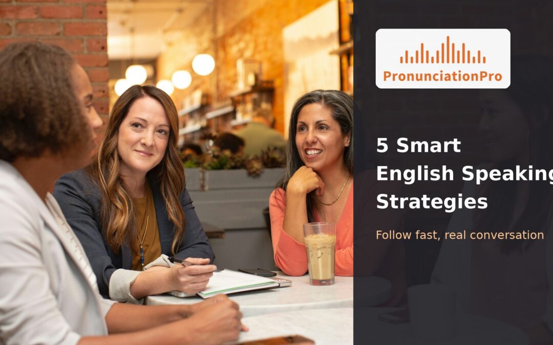 Four women in conversation around a small cafe table